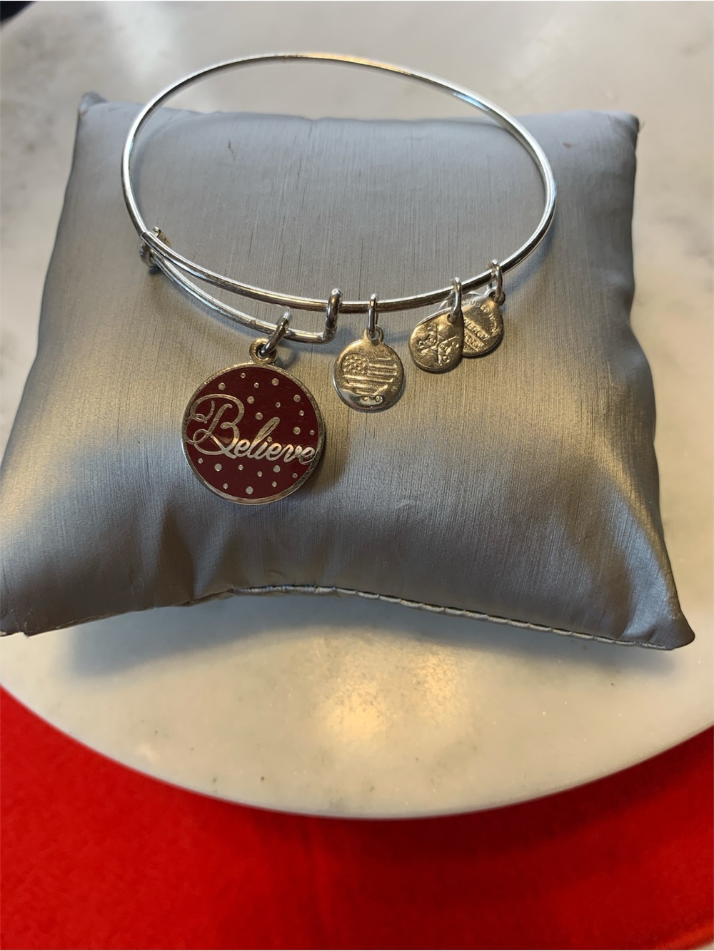 Silver Tone 'Believe' Charm Bangle Bracelet - Red Enamel Accent